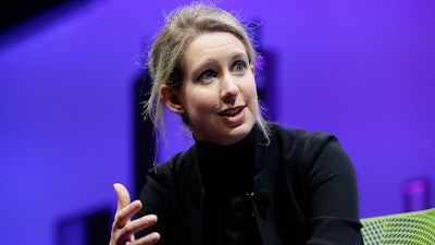 In this Nov. 2, 2015 file photo, Elizabeth Holmes, founder and CEO of Theranos, speaks at the Fortune Global Forum in San Francisco. Oscar-winning filmmaker Alex Gibney has premiered his latest documentary on the fraudulent tech startup Theranos at the Sundance Film Festival Thursday night, Jan. 24, 2019.