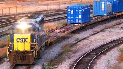In this Sept. 29, 1994 file photo, a CSX Train with spent nuclear fuel passes through Florence, S.C., on its way to Savannah River Site Weapons Complex near Aiken S.C. Nevada is suing the federal government in a bid to stop plans to ship plutonium from South Carolina to a former U.S. nuclear proving ground north of Las Vegas. Outgoing Republican Gov. Brian Sandoval on Tuesday, Dec. 4, 2018, is again vowing that the state will fight the Department of Energy plan to store radioactive bomb-making material at the Nevada Nuclear Security Site.