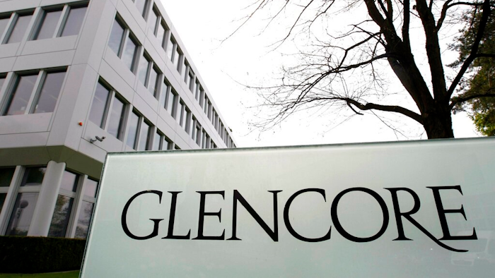 This April 14, 2011 file picture shows the Glencore headquarters in Baar, Switzerland. Commodities giant Glencore says it will cap how much coal it mines amid shareholder pressure to reduce emissions of greenhouse gases.