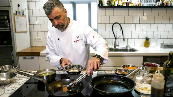 In this Wednesday, Jan. 16, 2019 photo, chef Amir Ilan prepares a lab-grown steak during a presentation by the Israeli company Aleph Farms, in Jaffa, Israel. Several Israeli start-ups have joined a handful of companies around the globe trying to develop lab-grown meat, something they see as a solution to the needs of the world’s ever-growing population and burgeoning demand for food.