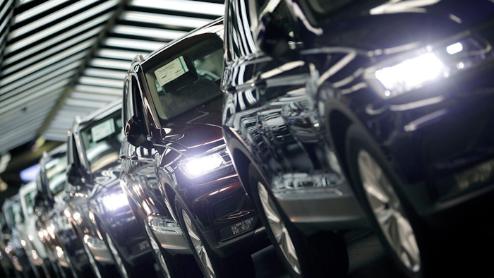 In this March 8, 2018 file photo photo Volkswagen cars are pictured during a final quality control at the Volkswagen plant in Wolfsburg, Germany. Germany's economic growth has stagnated in the last three months of the year.