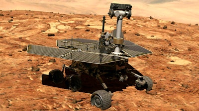 This illustration made available by NASA shows the rover Opportunity on the surface of Mars. The exploratory vehicle landed on Jan. 24, 2004, and logged more than 28 miles (45 kilometers) before falling silent during a global dust storm in June 2018. There was so much dust in the Martian atmosphere that sunlight could not reach Opportunity's solar panels for power generation.