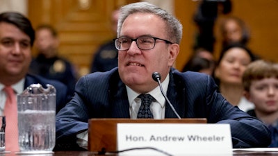In this Jan. 16, 2019, file photo, acting Environmental Protection administrator Andrew Wheeler arrives to testify at a Senate Environment and Public Works Committee hearing on Capitol Hill in Washington. The EPA says it is moving forward with a response to a class of long-lasting chemical contaminants, amid criticism from members of Congress and environmentalists that it has not moved aggressively to regulate them. In an interview with ABC News Live, Wheeler calls the chemicals commonly referred to as PFAS, “a very important threat.”