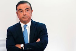 In this Oct. 6, 2017, file photo, then Renault Group CEO Carlos Ghosn listens during a media conference at La Defense business district, outside Paris. Carmaker Renault has alerted French authorities to a 50,000-euro gift from the chateau of Versailles to its former chairman and CEO Carlos Ghosn, reportedly linked to his lavish wedding there. French newspaper Le Figaro reported that the chateau allowed Ghosn to host his wedding reception on its grounds in exchange for Renault's philanthropic activities to support the Versailles estate, resplendent home to France's last kings.