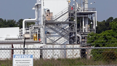 This June 15, 2018, file photo shows the Chemours Company's PPA facility at the Fayetteville Works plant near Fayetteville, N.C. where the chemical known as GenX is produced. The EPA said in a violation notice letter this week that The Chemours Co. also failed to provide information showing when the company learned the chemical GenX contaminated water wells and properties around its factories near Fayetteville and Parkersburg, W. Va.. The agency says the violations found came after inspecting the two plants in 2017.