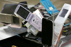 In this April 1, 2017, file photo, gold tablets of 3 grams, left, which is able to be recycled from 100 mobile phones, are shown as example in Tokyo. Tokyo Olympic organizers said in a statement Friday, Feb. 8, 2019, they expect to collect enough obsolete electronic devices by the end of March to reach the amount that will be required to manufacture all Olympic and Paralympic medals.