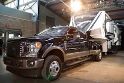 In a photo from, Wednesday, Jan. 30, 2019, in Detroit, a Ford F350 King Ranch truck is displayed at Eastern Market. All three Detroit automakers are rolling out new heavy-duty pickup trucks this year, courting buyers who tow heavy trailers for work or recreation. The introductions are sure to spark claims about horsepower, torque, towing capacity and payload hauling.