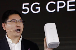 In this Jan. 24, 2019, file photo Richard Yu, CEO of the Huawei consumer business group speaks as he unveils the wireless router running with 5G modem Balong 5000 chipset in Beijing. Security experts say the U.S. government is likely exaggerating the threat it says the Chinese telecommunications giant Huawei poses to the world’s next-generation wireless networks. Critics say the U.S. case is short on specifics and glosses over the fact that China doesn’t need secret access to Huawei routers to infiltrate global networks.