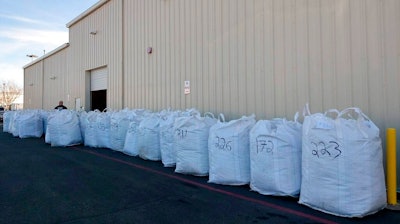 In this undated photo provided by Idaho State Police, authorities believe the leafy, green substance they found in a truck at the U.S. Customs and Border Protection, Boise Port of Entry in Boise, Idaho, is marijuana. A company has filed a lawsuit against Idaho State Police and Ada County after authorities seized nearly 7,000 pounds of cannabis from a truck on Jan. 24, 2019, headed to Colorado, the Idaho Statesman reported. The Idaho State Police has sent a sample of the product to a lab for testing.