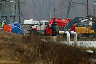 Excavation equipment is used to search for an oil leak close to where the TransCanada Corp's Keystone oil pipeline runs through northern St. Charles County off of Highway C, Thursday, Feb. 7, 2019, near St. Charles, Mo. The source of the oil leak has not yet been identified but the Keystone oil pipeline has been shut and the Missouri Department of Natural Resources official said the the release is stopped.