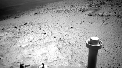 This image sent by NASA's Opportunity rover on Wednesday, Jan. 7, 2015 shows a view from atop a hill on Mars.