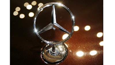 In this Feb. 5, 2015 file photo the logo of a Mercedes car is photographed during an annual press conference of Daimler AG in Stuttgart, Germany. Daimler hat its annual press conference on Wednesday.