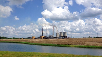 This June 3, 2014, file photo shows a panoramic view of the Paradise Fossil Plant in Drakesboro Ky. President Donald Trump's vow to save the coal industry will be tested this week when a utility board he appoints weighs whether to close a coal-fired power plant in Kentucky whose suppliers include a mine owned by one of his campaign donors. An environmental assessment by the Tennessee Valley Authority recommends shuttering the remaining coal-fired unit at the Paradise Fossil Plant in Muhlenberg County. The board could vote on Thursday, Feb. 14, 2019.