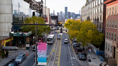 In this Nov. 7, 2018, file photo traffic moves along 44th Drive in Long Island City in the Queens borough of New York. According to experts analyzing the e-commerce giant's sudden cancellation of plans to build a massive headquarters in New York City, Amazon's decision to walk away could scare off other tech companies considering moving to or expanding in the city.