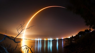 This photo shows a time exposure from the shore of the Banana River near Port Canaveral of the launch of the SpaceX Falcon 9 rocket from Cape Canaveral, Fla., Thursday, Feb. 21, 2019 An Israeli spacecraft blasted off to the moon in an attempt to make the country’s first lunar landing, following a launch Thursday night by SpaceX.