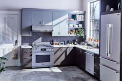 This photo provided by Signature Kitchen Suite shows a kitchen showcasing Signature Kitchen Suite appliances. Signature Kitchen Suite is one of several companies working on tech capabilities for the kitchen, like having appliances communicate with each other to create shopping lists, meal recommendations and cooking instruction. Zach Elkin, general manager of Signature, says they've even coined a term for the next gen of forward-thinking cooks: 'Technicureans'. 'These homeowners are far more tech-focused than previous generations. They've upped their culinary expectations to include precise prep and flexible cooking experiences, along with their desire for leading-edge design.'