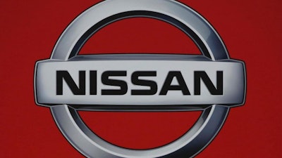 In this Wednesday, Jan. 9, 2019 file photo, a view of a logo of Nissan Motor Co., at its global headquarters in Yokohama, Japan. Nissan has cancelled plans to make its X-Trail SUV in the UK _ a sharp blow to Brexit supporters, who had fought to have the model built in northern England. The move, first reported on Saturday, Feb. 2, 2019 by Sky News, was confirmed by the company in a letter to workers Sunday.