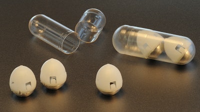This undated photo provided by researchers in February 2019 shows the components of swallowable self-righting device which can inject drugs from inside the stomach. The new invention, reported Thursday, Feb. 7, 2019, by an MIT-led research team, has been tested only in animals so far. But if it pans out, it might offer a work-around to make not just insulin but a variety of usually injected medicines a little easier to take.