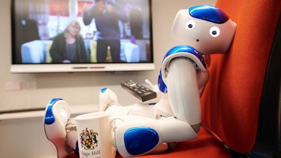 Edge Hill University's Robbie the Robot catches up on soap opera 'Emmerdale' to recognize dementia signs.