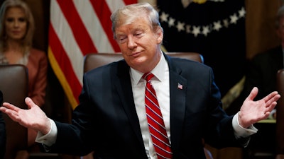 President Donald Trump speaks during a cabinet meeting at the White House, Tuesday, Feb. 12, 2019, in Washington.