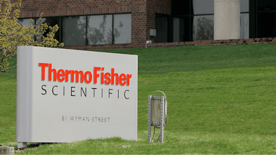 This April 26, 2007, file photo, shows the exterior of Thermo Fisher Scientific Inc., of Waltham, Mass. The Wall Street Journal reports Thermo Fisher Scientific Inc. will no longer sell or service genetic sequencers in China's Xinjiang region following criticism that they were used for surveillance that enabled human rights abuses.