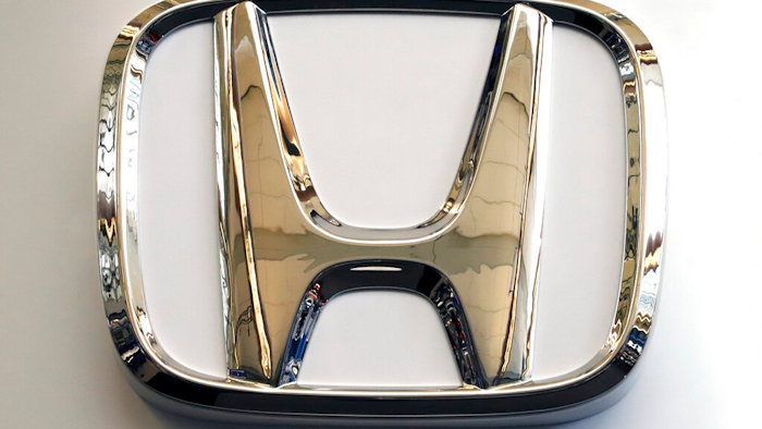 In this Feb. 14, 2019, photo, this photo shows the Honda logo on a sign at the 2019 Pittsburgh International Auto Show in Pittsburgh. Honda will be recalling about 1 million older vehicles in the U.S. and Canada because the Takata driver's air bag inflators that were installed during previous recalls could be dangerous. Documents posted Monday, March 11, 2019, by Canadian safety regulators show that Honda is recalling many of its most popular models for a second time.