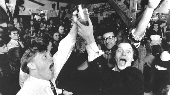 In this Wednesday March 2, 1989 file photo, Icelanders celebrate in a Reykjavik bar, as the first legal beer since 1915 went on sale in the Icelandic capital. On Friday, March 1, 2019 the country toasts the anniversary of the lifting of a decades-long ban on beer with what else? - a nationwide Beer Day.