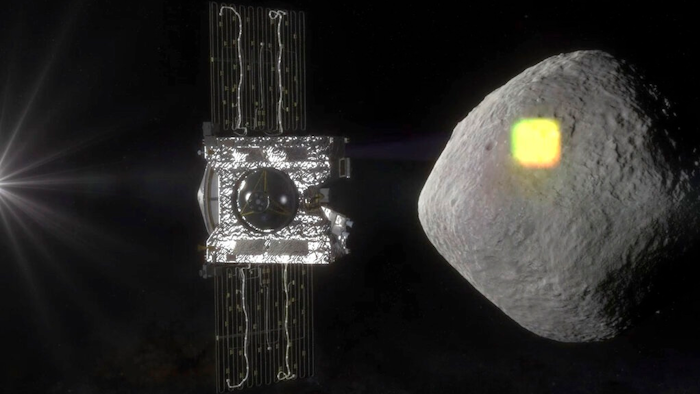 This artist's rendering made available by NASA in July 2016 shows the mapping of the near-Earth asteroid Bennu by the OSIRIS-REx spacecraft. Scientists had thought the asteroid Bennu had wide, open areas to scoop up dirt and gravel. But on Tuesday, March 19, 2019, NASA announced the probe hasn’t found any big spots for sampling.