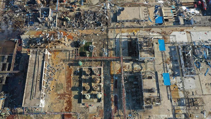 In this aerial photo released by China's Xinhua News Agency, damaged buildings are seen at the site of a factory explosion in a chemical industrial park in Xiangshui County of Yancheng in eastern China's Jiangsu province, Friday, March 22, 2019. The local government reports the death toll in an explosion at a chemical plant in eastern China has risen with dozens killed and more seriously injured.
