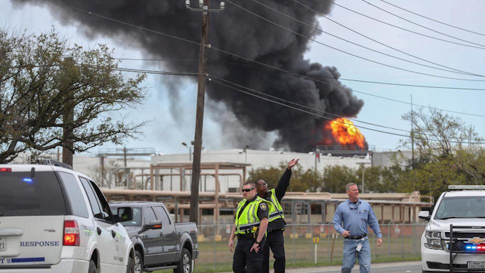 Smoke rises from a fire burning at the Intercontinental Terminals Company in Deer Park, east of Houston, Sunday, March 17, 2019. Some residents in the area are being urged to find a safe location indoors after the fire broke out at the petrochemicals terminal.