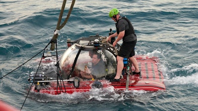 A submarine launched from the Ocean Zephyr is tested off the coast of Victoria, the capital of the Seychelles on Tuesday March 5, 2019. The British-based Nekton mission will explore the Indian Ocean, during which scientists hope to document changes taking place beneath the waves that could affect billions of people in the surrounding region over the coming decades.