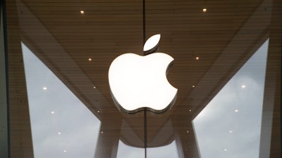 In this Jan. 3, 2019, file photo the Apple logo is displayed at the Apple store in the Brooklyn borough of New York. A jury announced the verdict Friday, March 15, that Apple should pay $31 million in damages for infringing on patents for technology owned by mobile chip maker Qualcomm that helps iPhones quickly connect to the internet and extend their battery life.