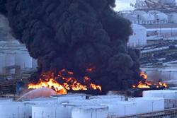 Firefighters battle a petrochemical fire at the Intercontinental Terminals Company Monday, March 18, 2019, in Deer Park, Texas. The large fire at a Houston-area petrochemicals terminal will likely burn for another two days, authorities said Monday, noting that air quality around the facility was testing within normal guidelines.