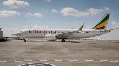 An Ethiopian Airlines Boeing 737 Max 8 sits grounded at Bole International Airport in Addis Ababa, Ethiopia Saturday, March 23, 2019. The chief of Ethiopian Airlines says the warning and training requirements set for the now-grounded 737 Max aircraft may not have been enough following the Ethiopian Airlines plane crash that killed 157 people.