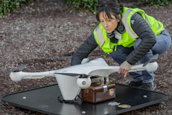 In this March 2019 photo provided by UPS, a drone operator handles a drone used for carrying medical specimens at a landing area at WakeMed hospital in Raleigh, N.C. UPS, Matternet and WakeMed announced a program on Tuesday, March 26, 2019, to use drones for commercial flights of blood samples and other medical specimens at the North Carolina hospital campus.