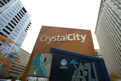 This Nov. 13, 2018, file photo shows a sign of a street map for Crystal City neighborhood of Arlington, Va. Protesters repeatedly shouted 'shame' as a northern Virginia county board Saturday unanimously approved a $23 million incentives package for Amazon to build a new headquarters there.