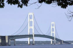 In this July 19, 2002 file photo, the Mackinac Bridge that spans the Straits of Mackinac is shown from Mackinaw City, Mich. Michigan Gov. Gretchen Whitmer has ordered state departments and agencies to take no further action on legislation enacted in late 2018 authorizing construction of an oil pipeline tunnel beneath lakes Huron and Michigan. On Thursday, March 28, 2019, Michigan Attorney General Dana Nessel, deemed unconstitutional a 2018 law that established a panel to oversee construction and operation of an oil pipeline tunnel beneath the channel linking Lakes Huron and Michigan.