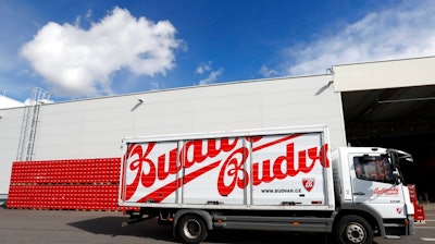 In this photo taken on Monday, March 11, 2019, a truck drives past cases of beer at the Budejovicky Budvar brewery in Ceske Budejovice, Czech Republic. The Budejovicky Budvar brewery in the Czech Republic managed to survive a decades-long trademark battle over whether it could call its beer Budweiser. But now it faces another potential threat: Brexit. The United Kingdom is one of the brewer’s top five markets, and like many other businesses, it’s concerned about what will happen if Britain leaves the European Union without an agreement governing trade.