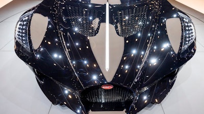 The New car Bugatti La voiture Noire is presented during the press day at the '89th Geneva International Motor Show' in Geneva, Switzerland, Tuesday, March 5, 2019. The 'Geneva International Motor Show' takes place in Switzerland from March 7 until March 17, 2019. Automakers are rolling out new electric and hybrid models at the show as they get ready to meet tougher emissions requirements in Europe - while not forgetting the profitable and popular SUVs and SUV-like crossovers.