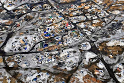 This Feb. 13, 2017 aerial photo shows the Oceti Sakowin camp, where people have gathered to protest the Dakota Access pipeline on federal land in Cannon Ball, N.D. South Dakota Gov. Kristi Noem says she's proposing legislation ahead of the Keystone XL oil pipeline's construction that would create a legal avenue to pursue out-of-state money that funds protests aimed at slowing construction. Noem's bills come after opponents of the Dakota Access oil pipeline staged large protests that resulted in 761 arrests in southern North Dakota over a six-month span beginning in late 2016. The state spent tens of millions of dollars policing the protests.