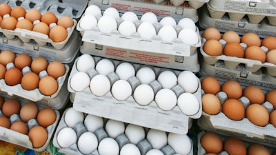 In this May 14, 2008 file photo, cartons of eggs are displayed for sale in the Union Square green market in New York. The latest U.S. research on eggs won’t go over easy for those can’t eat breakfast without them. Study participants who ate about 1 ½ eggs daily had a slightly higher risk of heart disease than those who ate no eggs. The study showed the more eggs, the greater the risk. The chances of dying early were also elevated.