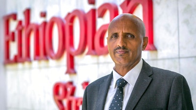 Tewolde Gebremariam, Chief Executive Officer of Ethiopian Airlines, poses for a photograph after speaking to The Associated Press at Bole International Airport in Addis Ababa, Ethiopia Saturday, March 23, 2019. The chief of Ethiopian Airlines says the warning and training requirements set for the now-grounded 737 Max aircraft may not have been enough following the Ethiopian Airlines plane crash that killed 157 people.
