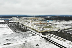 In this Nov. 28, 2018, file photo, snow covers the perimeter of the General Motors' Lordstown plant, in Lordstown, Ohio. GM employees in Lordstown and other factories in Michigan and Maryland that are targeted to close within a year say moving will force them to leave behind relatives, even their children, in some cases.