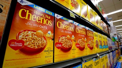 In this Aug. 8, 2018, file photo boxes of General Mills Honey Nut Cheerios cereal sit on display in a market in Pittsburgh. General Mills Inc. reports financial results Wednesday, March 20, 2019.