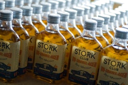 In this Thursday, Feb. 28, 2019 photo, bottles of a special edition of Stork Club rye whiskey stand in a storage room of the German whiskey maker Spreewood Distillerie in Schlepzig, Germany.