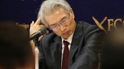 Junichiro Hironaka, Chief defense lawyer of former Nissan chairman Carlos Ghosn speaks during a press conference in Tokyo, Monday, March 4, 2019. Hironaka said Monday that Ghosn promised to accept camera surveillance as a way to monitor his activities if he is released from the detention center where he has been held since his Nov. 19 arrest. Ghosn has been charged with falsifying financial reports and breach of trust.