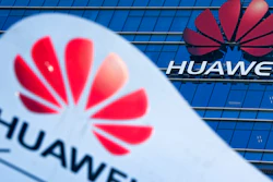 This Dec. 18, 2018 file photo shows company signage on display near the Huawei office building at its research and development center in Dongguan, in south China's Guangdong province. The Chinese tech giant Huawei has pleaded not guilty to U.S. charges that it stole trade secrets from T-Mobile. A company representative entered the pleas Thursday, Feb. 28, 2019, in federal court in Seattle, where a 10-count indictment was unsealed in January. Charges include conspiracy to steal trade secrets, attempted theft of trade secrets, wire fraud and obstruction of justice.
