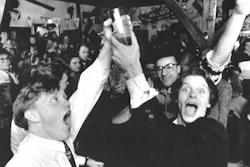 In this Wednesday March 2, 1989 file photo, Icelanders celebrate in a Reykjavik bar, as the first legal beer since 1915 went on sale in the Icelandic capital. On Friday, March 1, 2019 the country toasts the anniversary of the lifting of a decades-long ban on beer with what else? - a nationwide Beer Day.