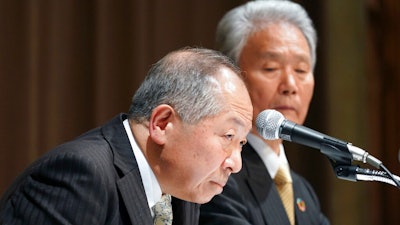 Co-chairs of the Special Committee for Improving Governance, Seiichiro Nishioka, left, and Sadayuki Sakakibara, right, attend a press conference in Yokohama, near Tokyo Wednesday, March 27, 2019. Nissan’s committee, set up to strengthen corporate governance after the arrest of former Chairman Carlos Ghosn, is recommending the Japanese automaker add more independent outside directors on its board and better oversee compensation and auditing.
