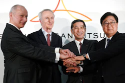 From left, Renault CEO Thierry Bollore, Renault Chairman Jean-Dominique Senard, Nissan CEO Hiroto Saikawa and Mitsubishi Motors Chairman and CEO Osamu Masuko pose for photographers after their joint press conference at the Nissan headquarters in Yokohama, near Tokyo, Tuesday, March 12, 2019. The chief executives of Renault, Nissan and Mitsubishi announced Tuesday a new board to oversee the French-Japanese auto alliance, in an effort to drive home a message about what they called “a new start” for the partnership, despite the recent arrest of former chairman Carlos Ghosn.